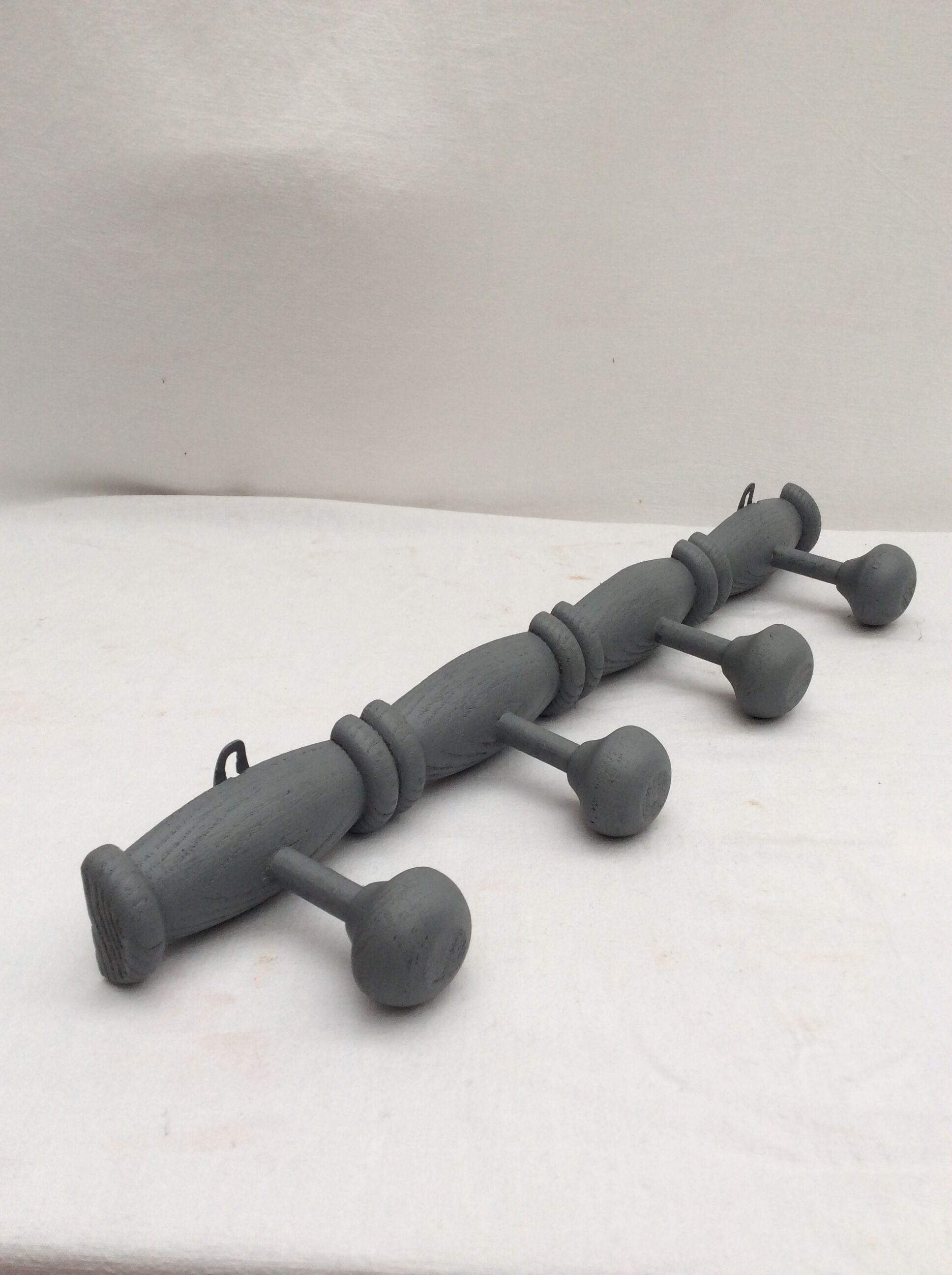 Grey wooden coat rack