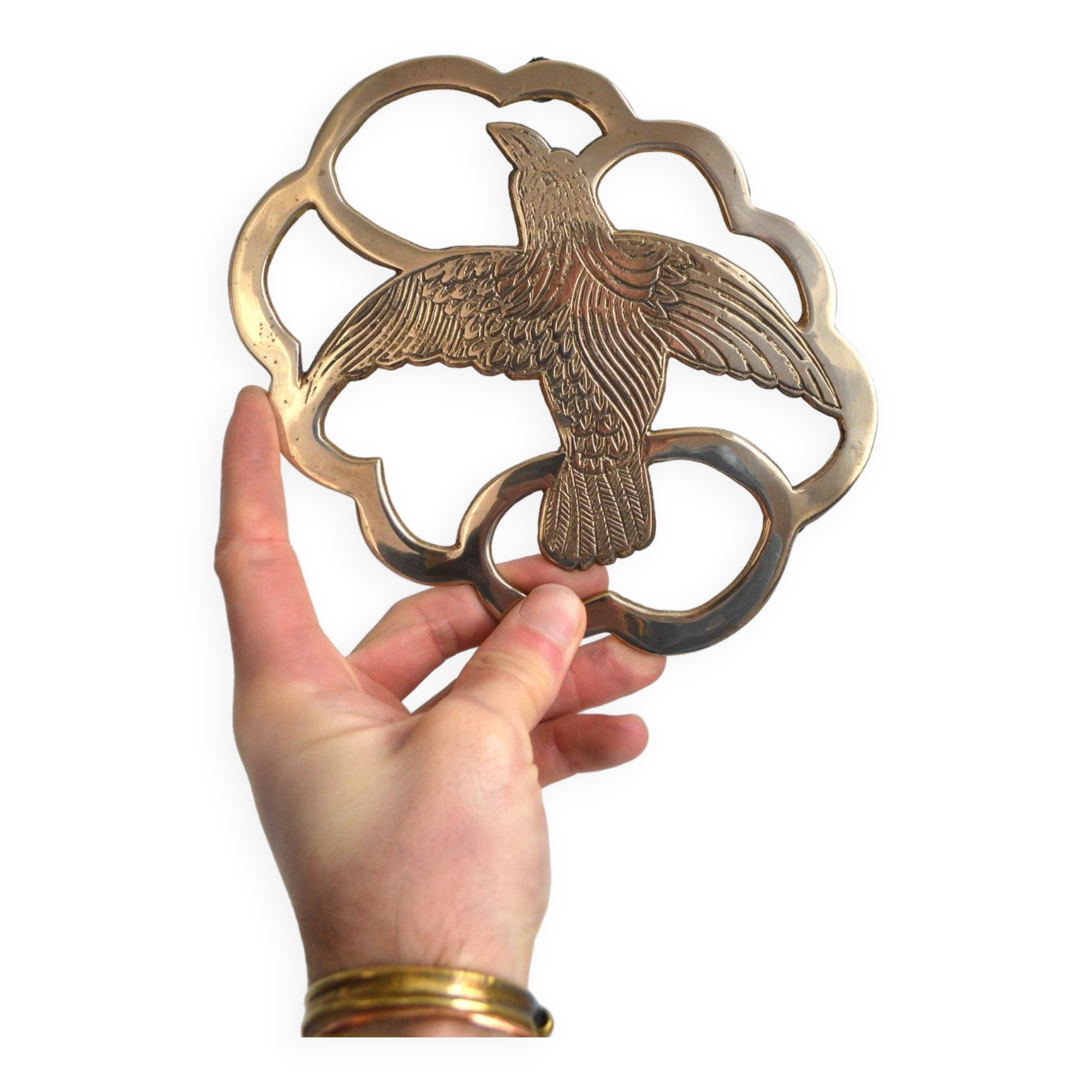 Brass bird trivet