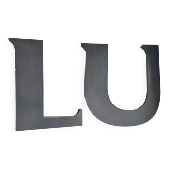 Old lu sign letters in zinc