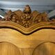 Large country pine bonnetière with carved details.