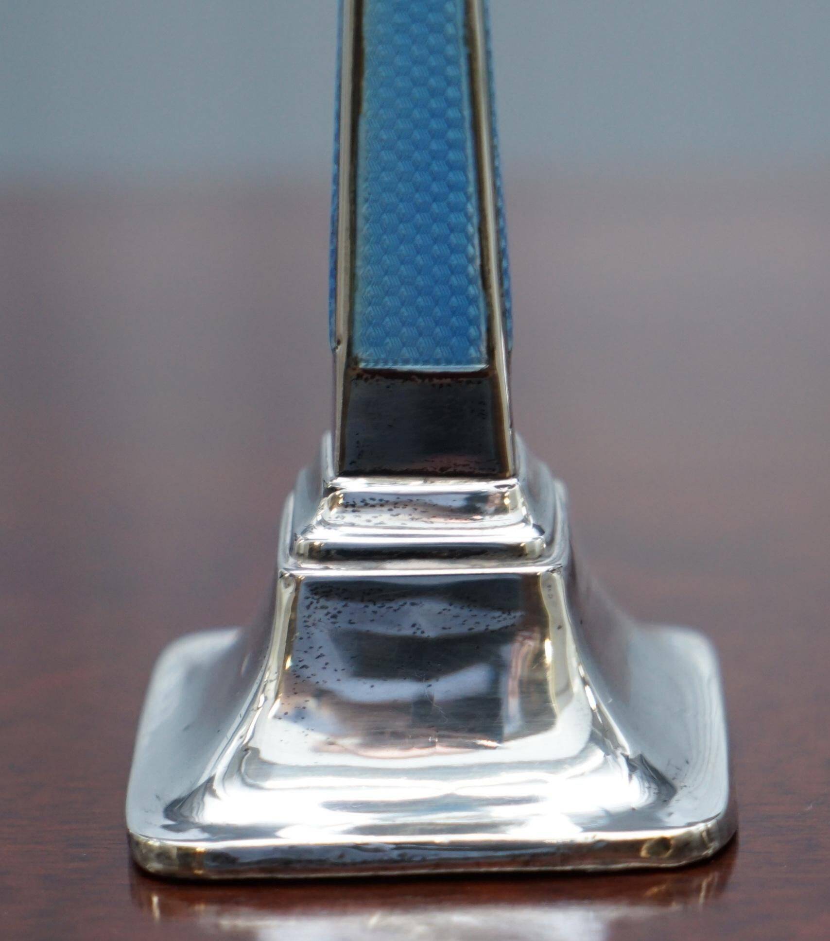 Pair of sterling silver and enamel candlesticks 1927 by Charles Green & Co.
