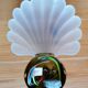 Pair of Deknudt shell wall lights
