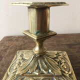 Old brass candle holder with square base