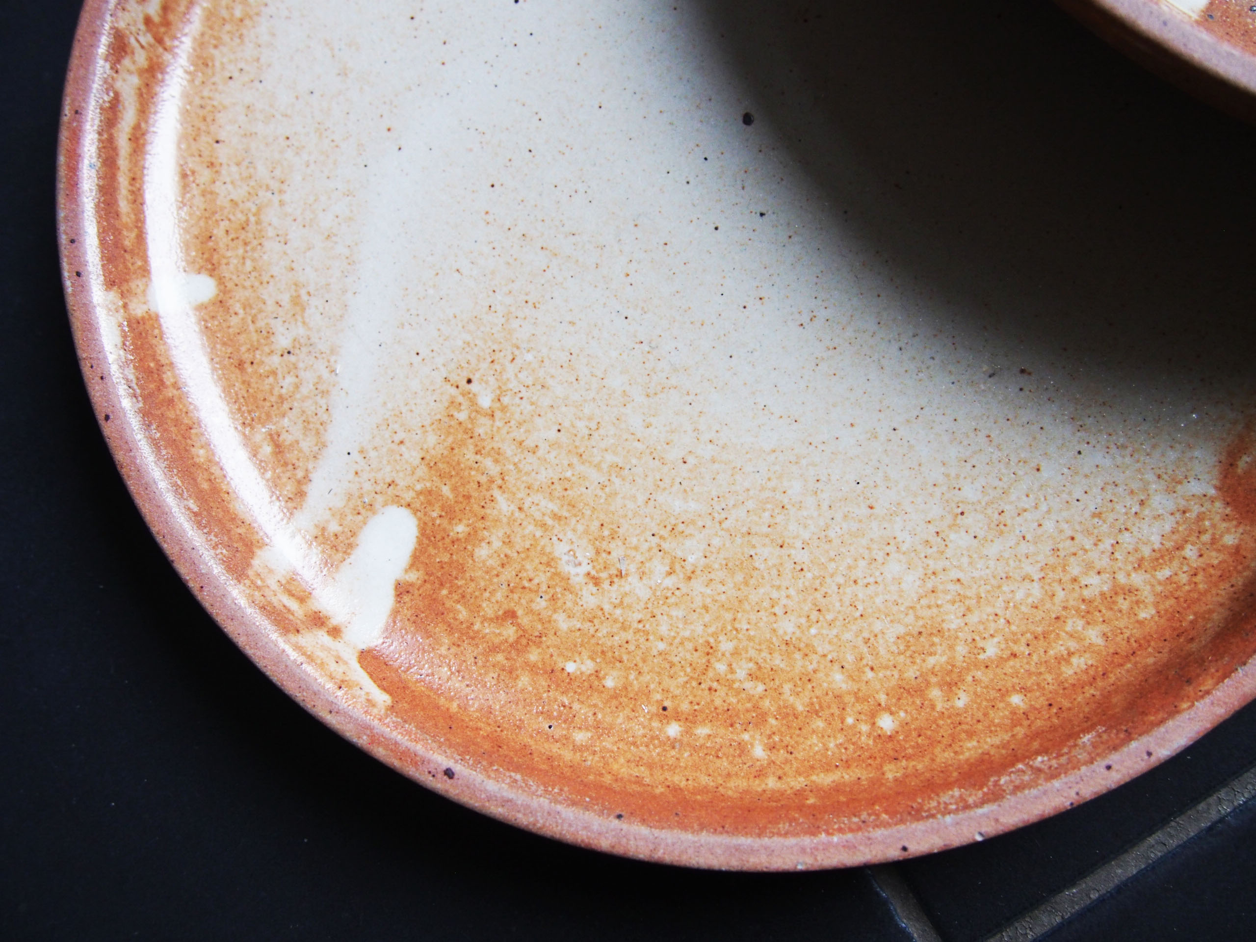 5 Enamelled sandstone sits