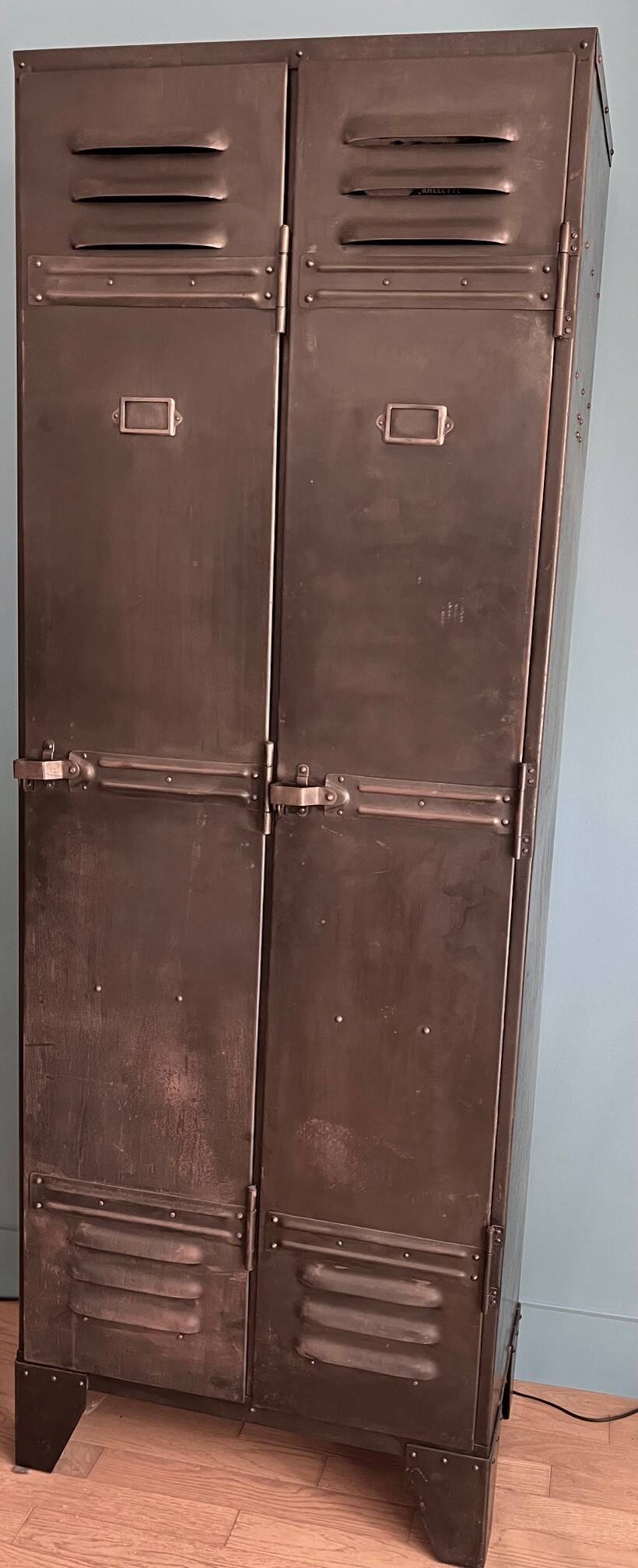 Double-door industrial locker room (circa 1920)