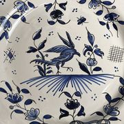 Moustiers, pairs of plates with wading bird design, scalloped edge, early 20th century.