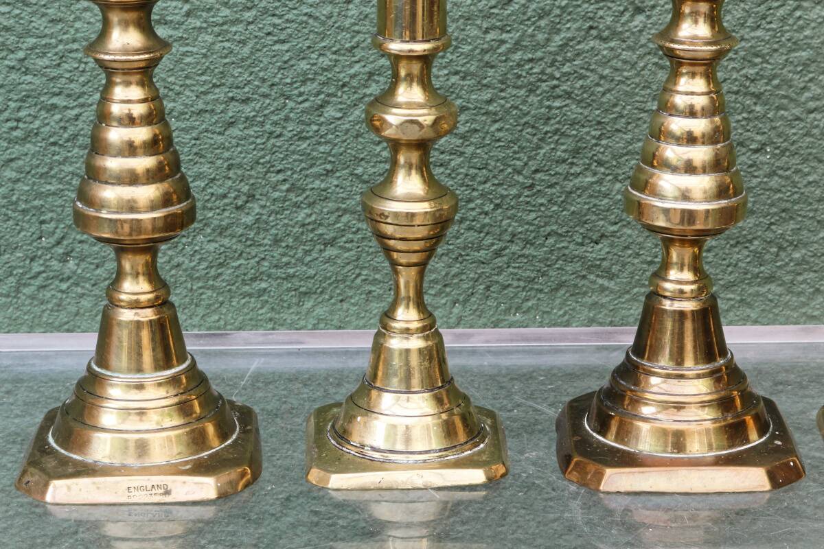 Set of 4 brass candlesticks, England, late 19th century