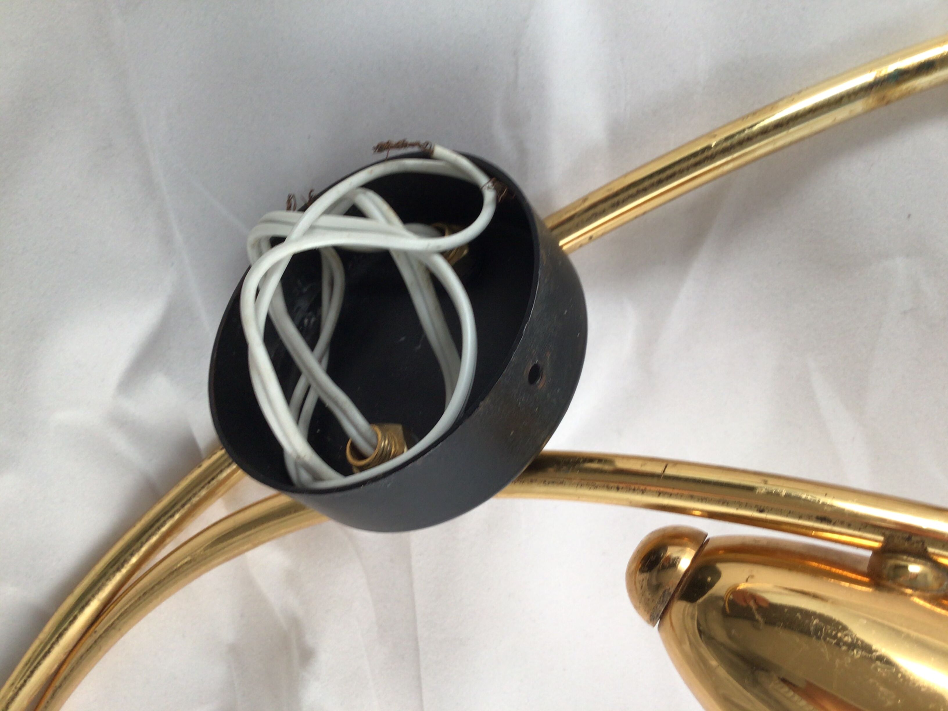 Pair of 60's gilded appliques 2 white conical lights