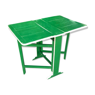 Small folding side table in painted wood