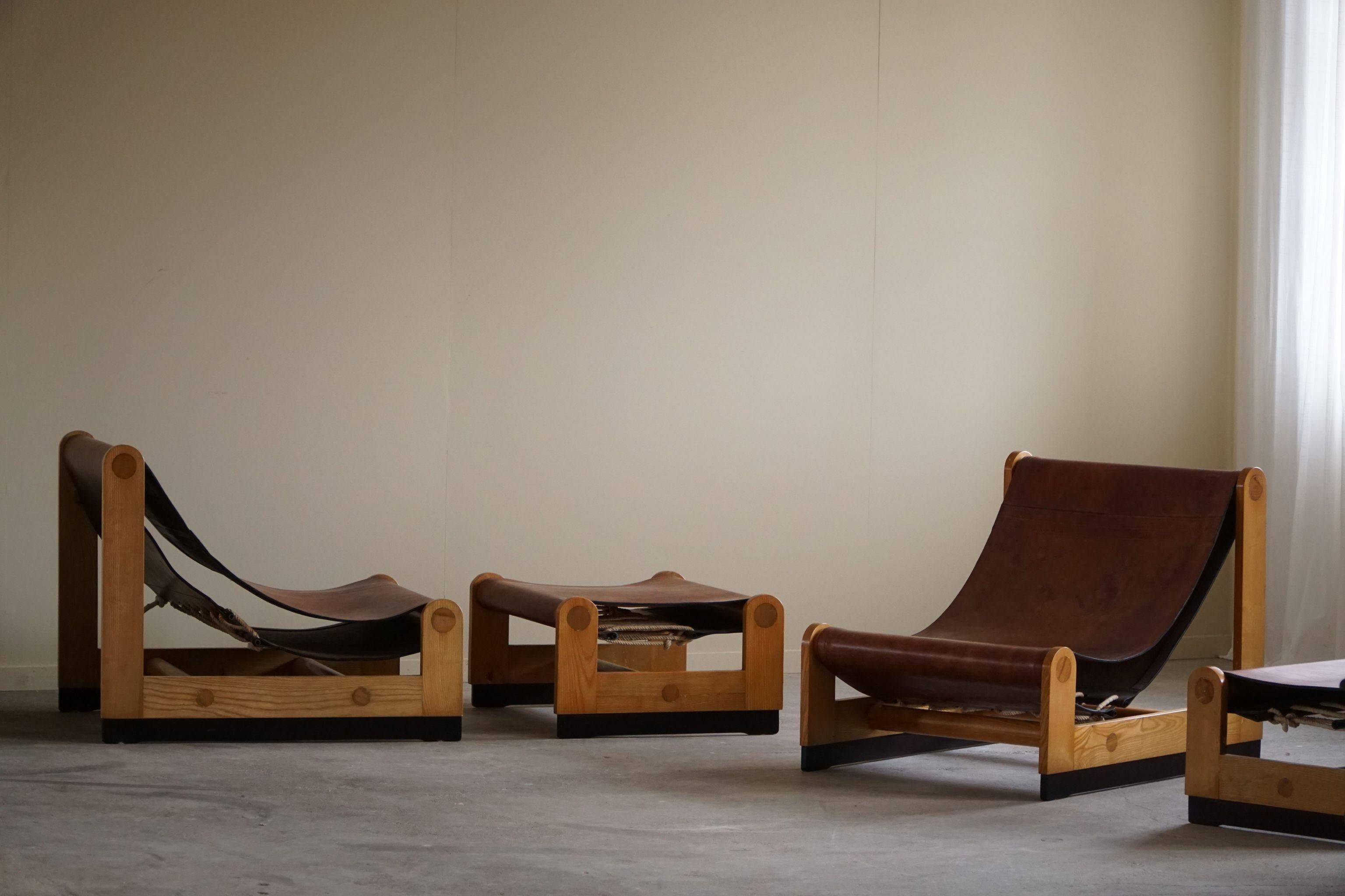 Francesco Lucianetti, Lounge chairs in leather and elm, Italian modern, 1960s