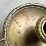 Brass candle holder with handle.