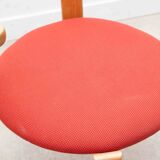 Chair upholstered in red and beech