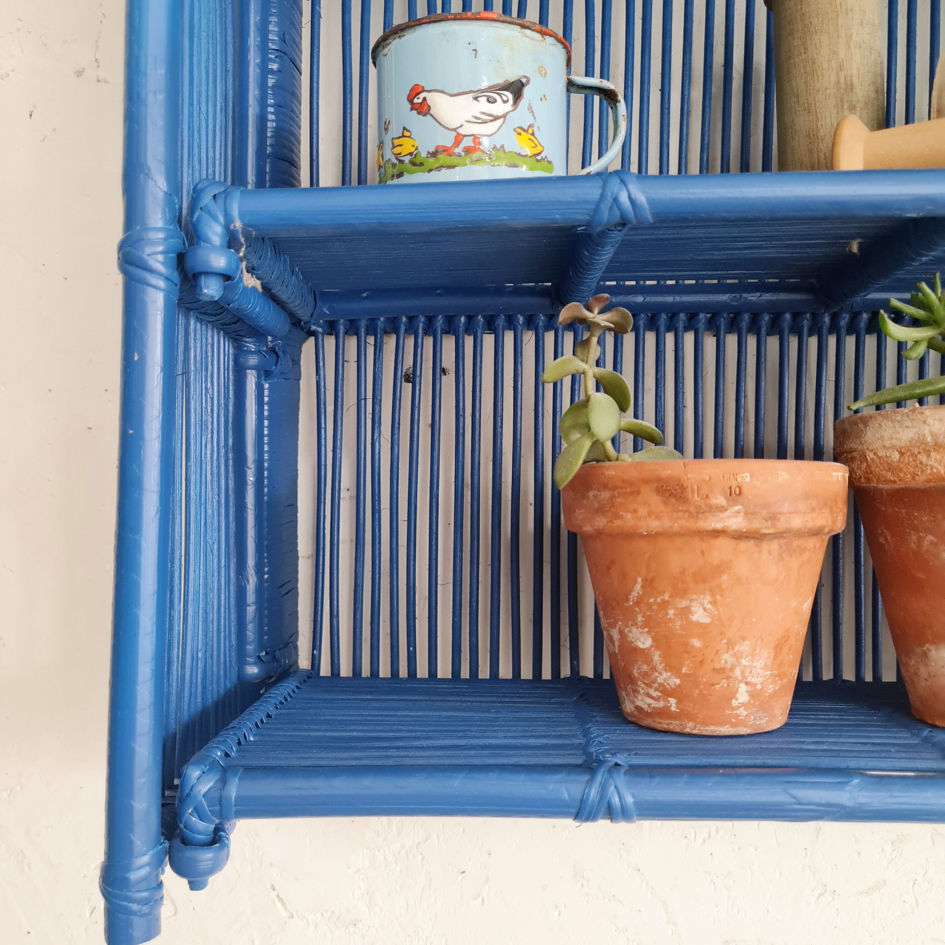 Vintage shelf in Klein blue rattan