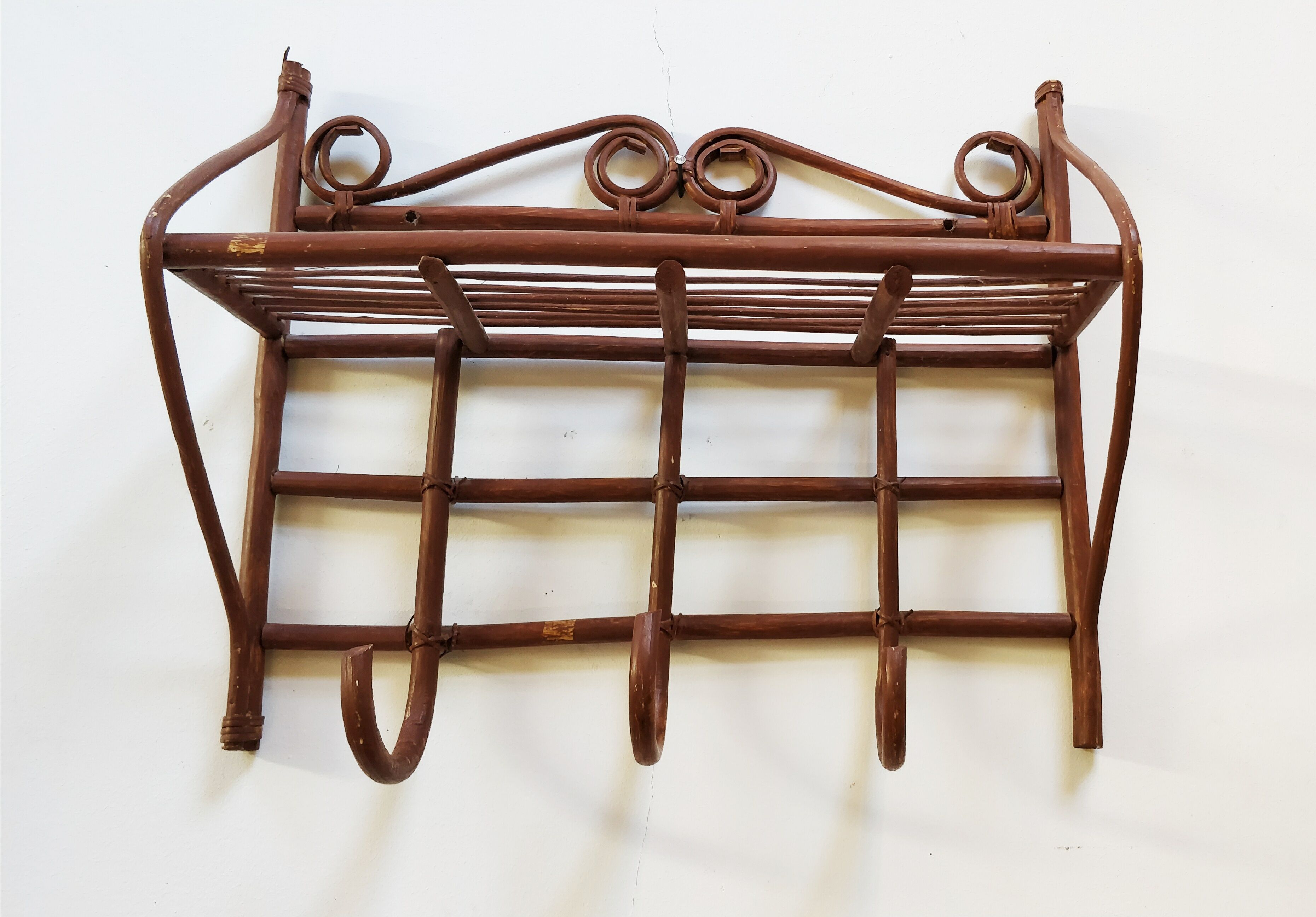 Rattan wall coat rack