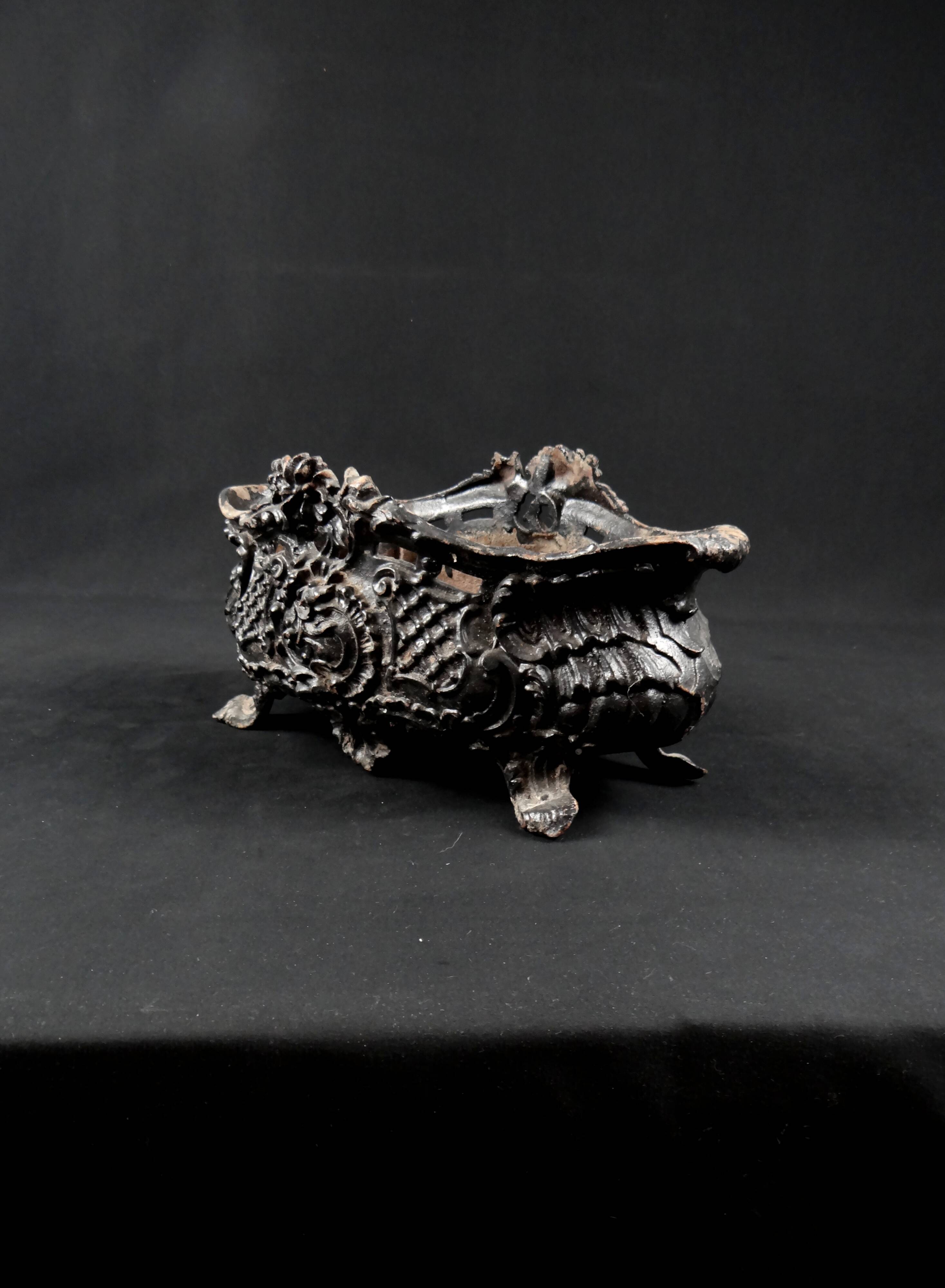 Antique black cast iron planter from the late 19th century Rocaille style