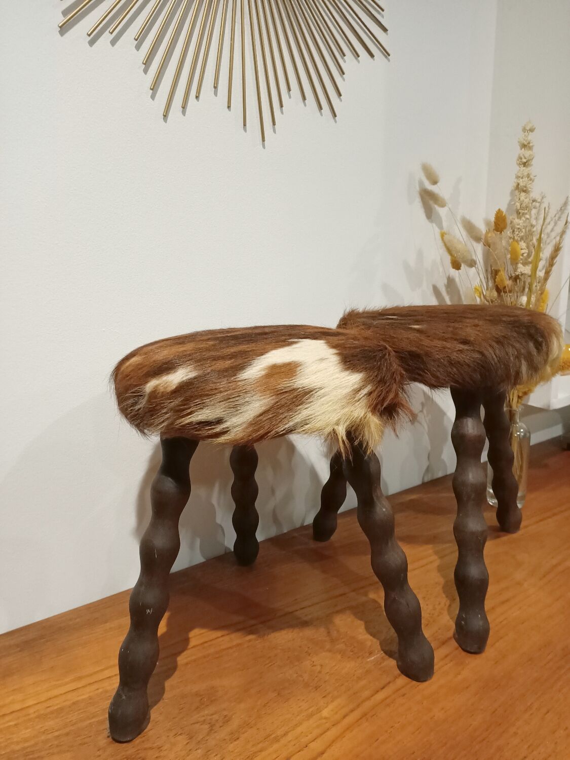 Duo of cowhide stools