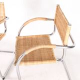 Pair of wicker and metal armchairs