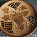 Empty pocket in openwork copper, chiseled and painted vine branches