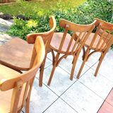 Suite of four foot bistro chairs with hoops / vintage 40s-50s