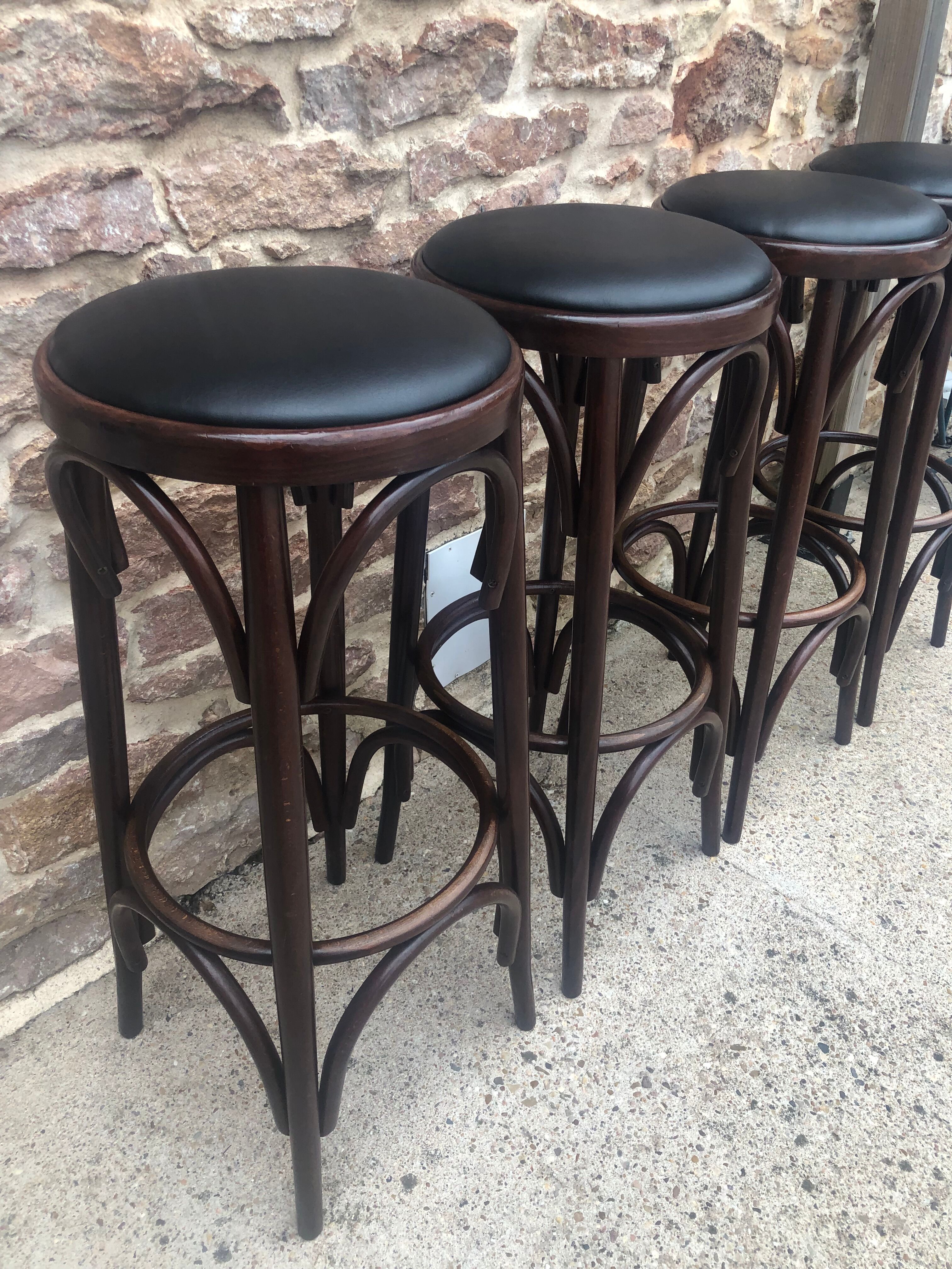 Suite of 4 bar stools