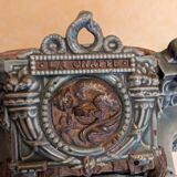 Mobile cast iron stove model "la chatte" designed by the French engineer Edmond Chaboche in 1883