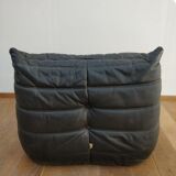 Togo in black leather by Ligne Roset