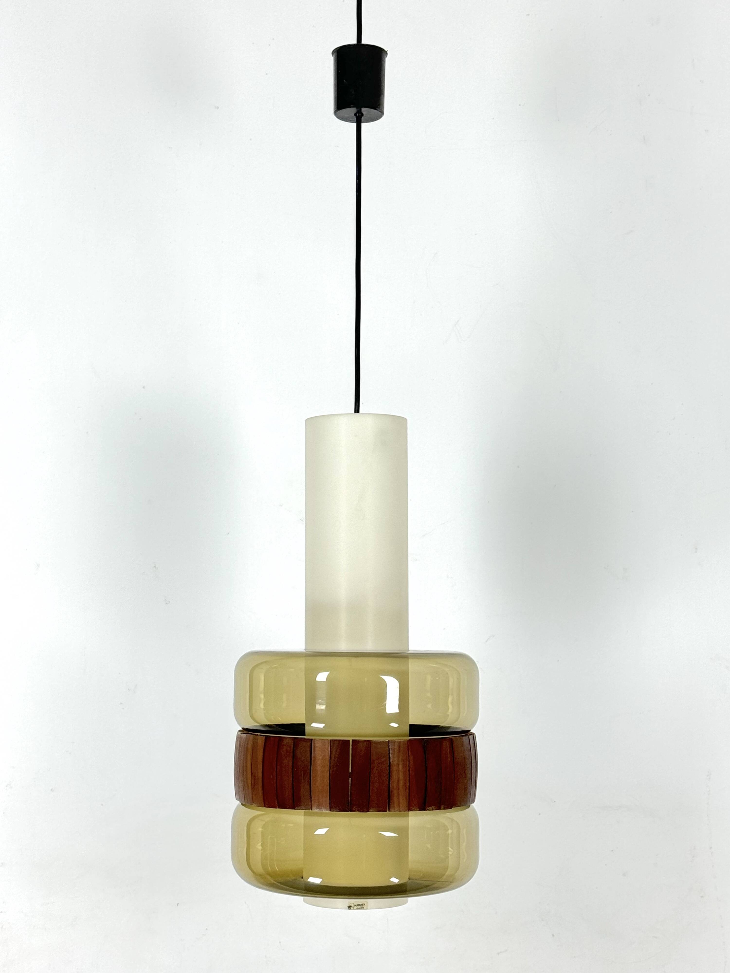 Mid-Century Harvey Guzzini pendant from 1960s. Labeled.