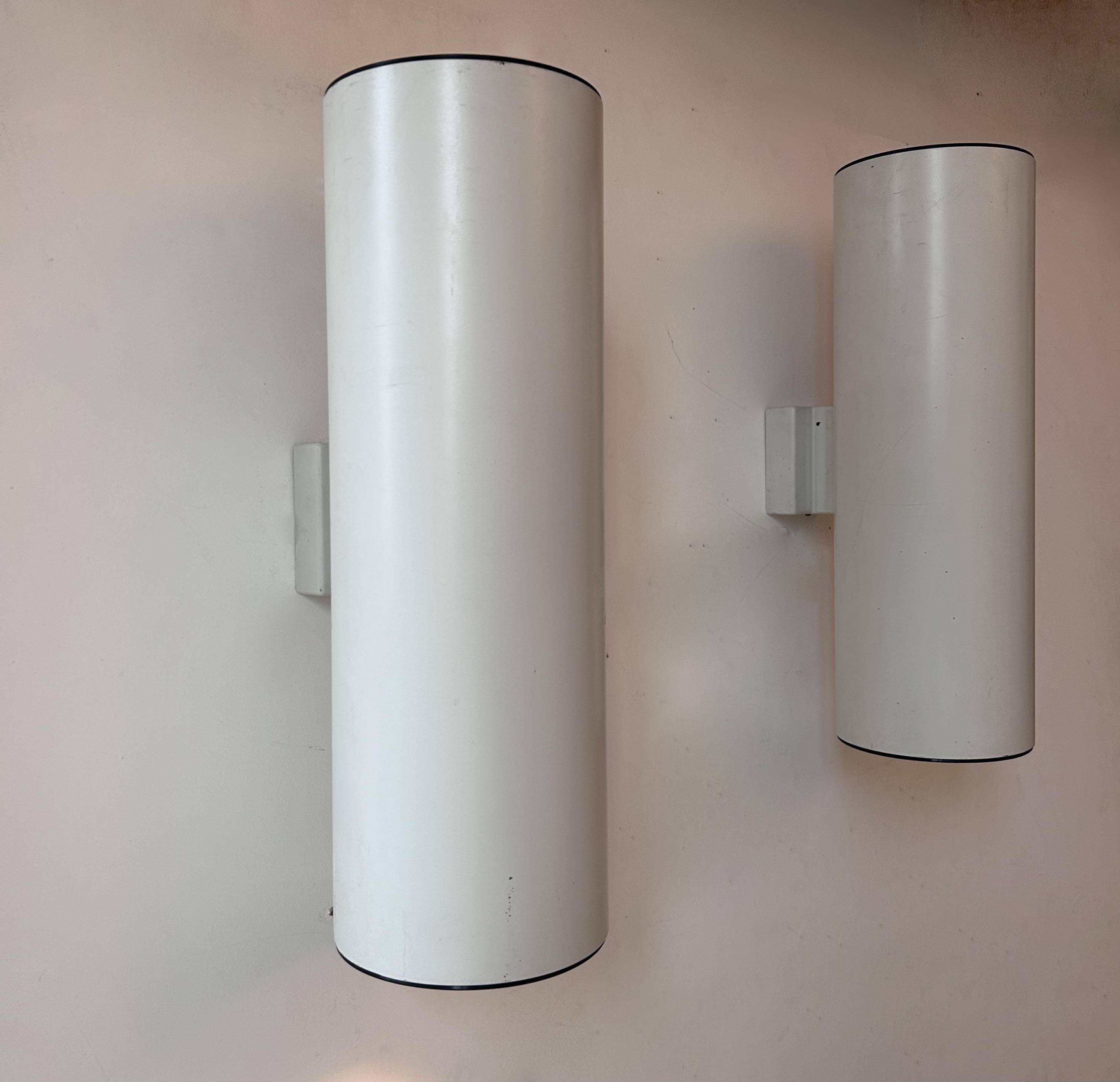 Pair of vintage cylindrical wall lights, matt white metal, Germany Erco 1976