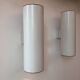 Pair of vintage cylindrical wall lights, matt white metal, Germany Erco 1976