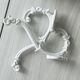 Bathroom décor, hooks, soap dish, white metal hangers.