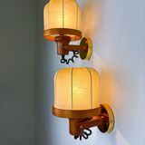 Pair of articulated "Cocoon" wall lights in resin and pine, Italy, circa 1970s