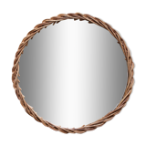 Decorative mirror tray surrounded by vintage rattan / wicker