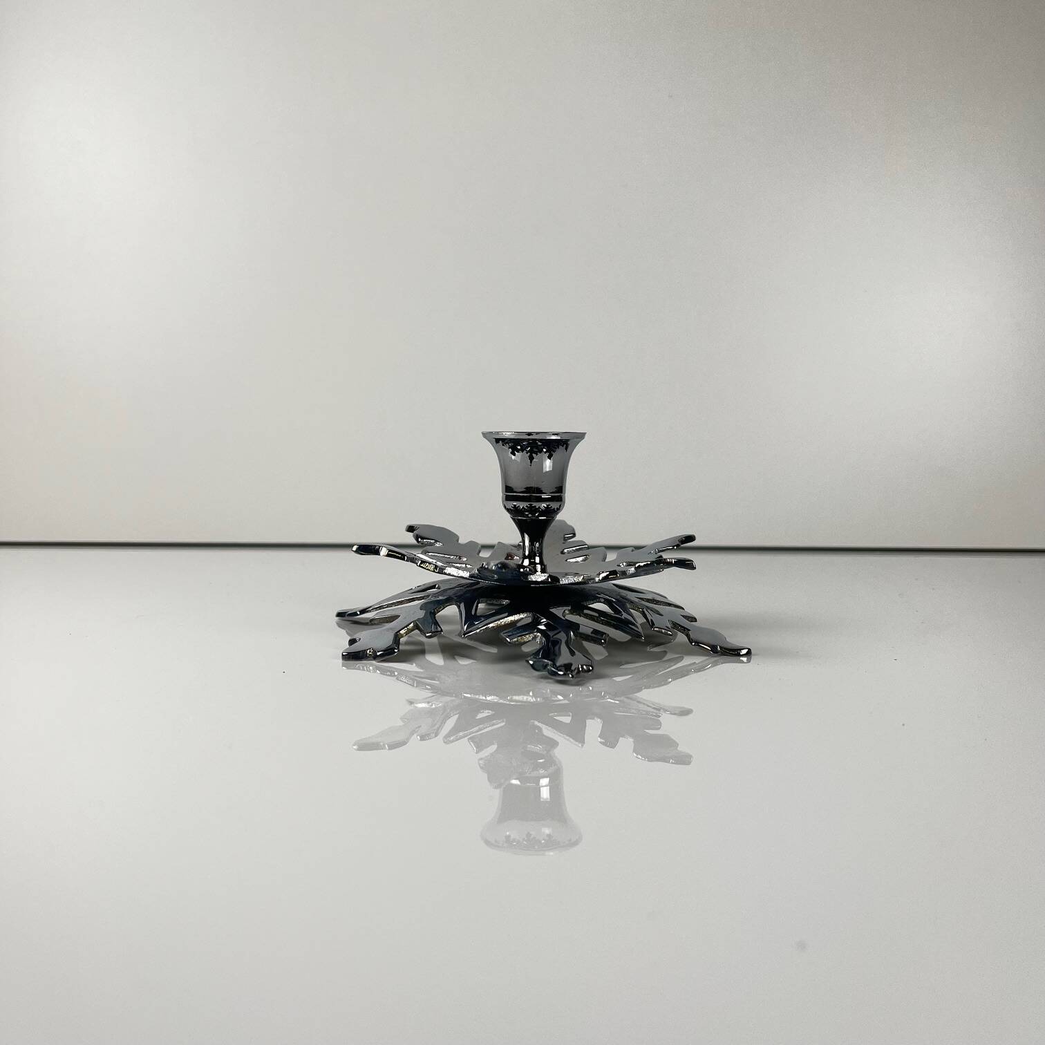 Silver metal snowflake candle holder