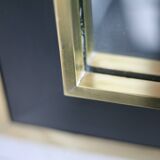 Jean-Claude Mahey mirror. Black lacquered wood and gold metal. 1970