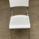 Space age chair with chrome metal and white schoolboy shell, desk 1970.