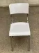 Space age chair with chrome metal and white schoolboy shell, desk 1970.