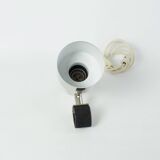 Nickel-plated chrome clip-on spot lamps for string shelf, headboard.