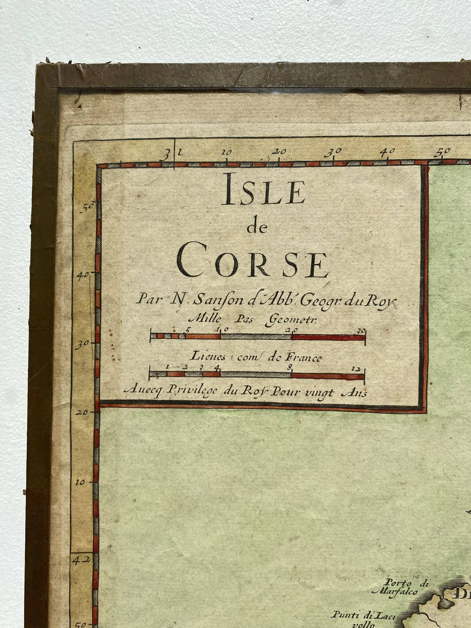 Old map of the Isle of Corsica framed under glass