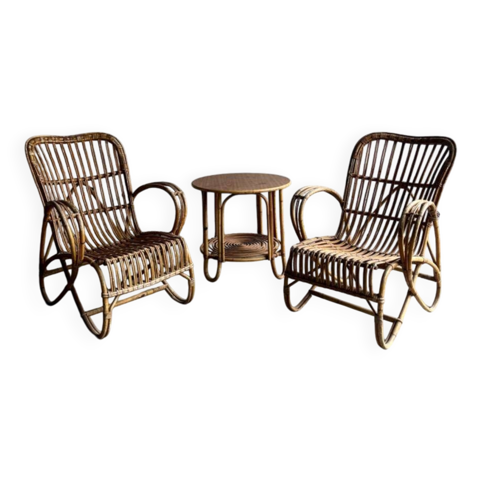 Pair of natural rattan lounge chairs with matching round table — brown mid-century boho set
