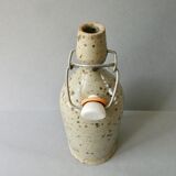 Sandstone bottle signed Guy Baudat, 70s