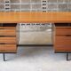Mahogany veneer desk by Pierre Guariche for Minvielle, 1950s