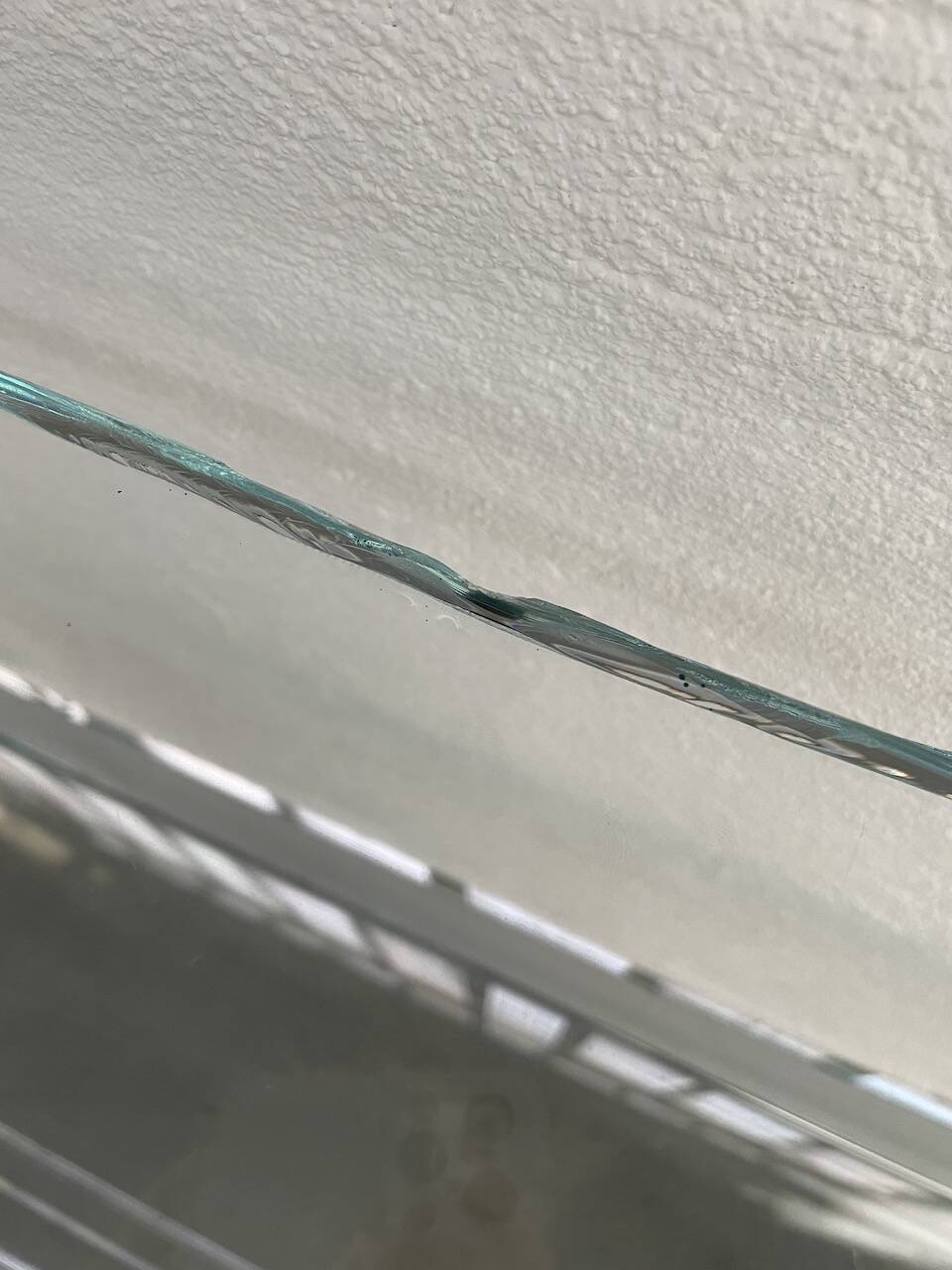 Pair of chrome and glass shelves from the 70s