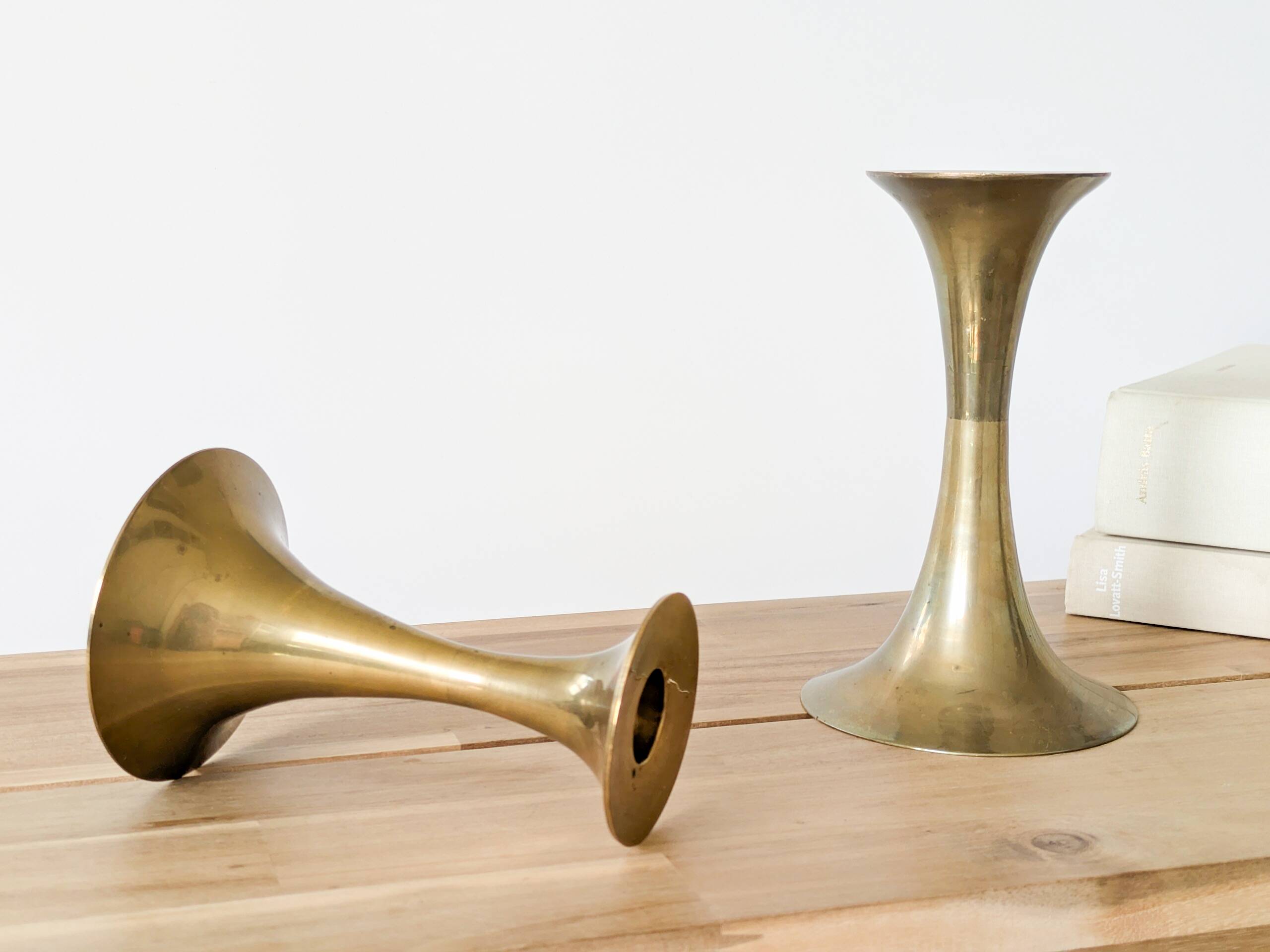 Pair of Midcentury brass candlesticks, flared shape.