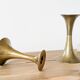 Pair of Midcentury brass candlesticks, flared shape.
