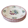 Lot de 5 assiettes plates, signé Longwy