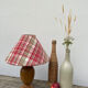 Wooden lamp and vintage red and green striped lampshade