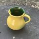 Vintage half-yellow and half-green glazed ceramic vase and pitcher