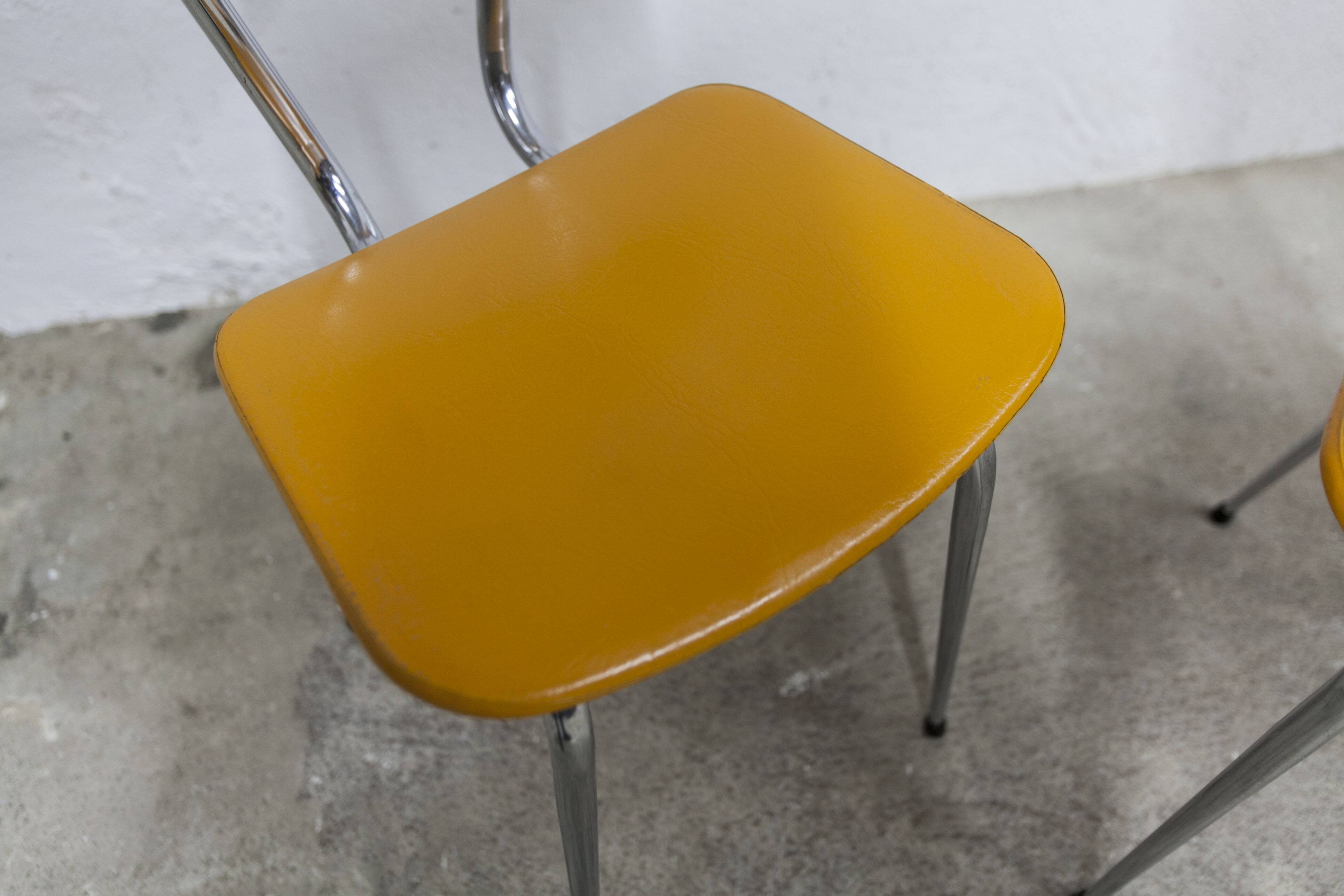 Pair of mustard-colored 70s welded Skai chairs
