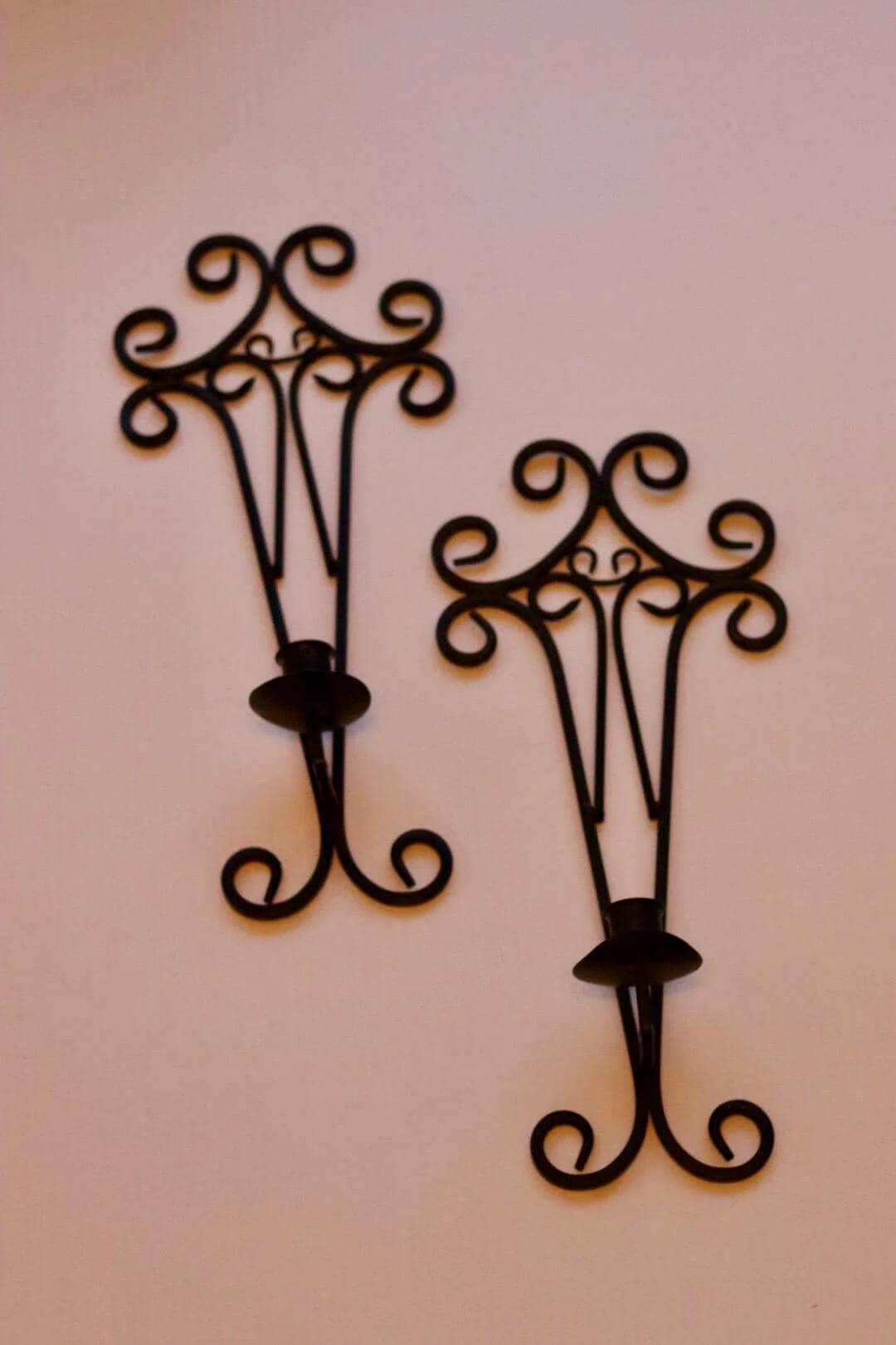 Pair of vintage black metal sconces