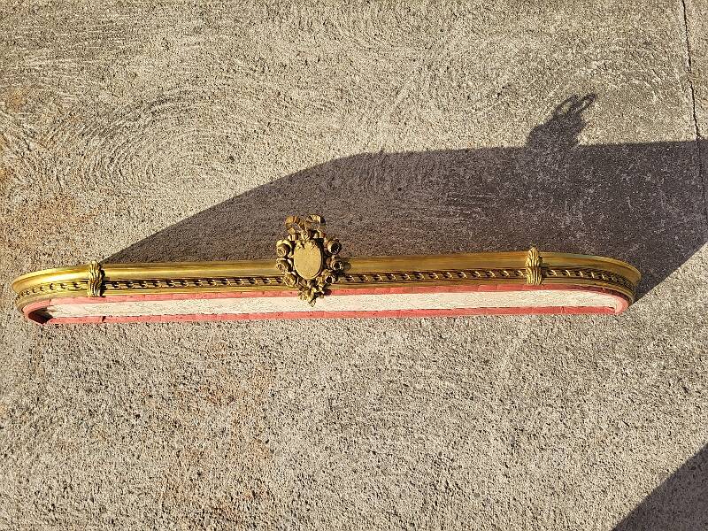 Old bed canopy in yellow copper and bronze